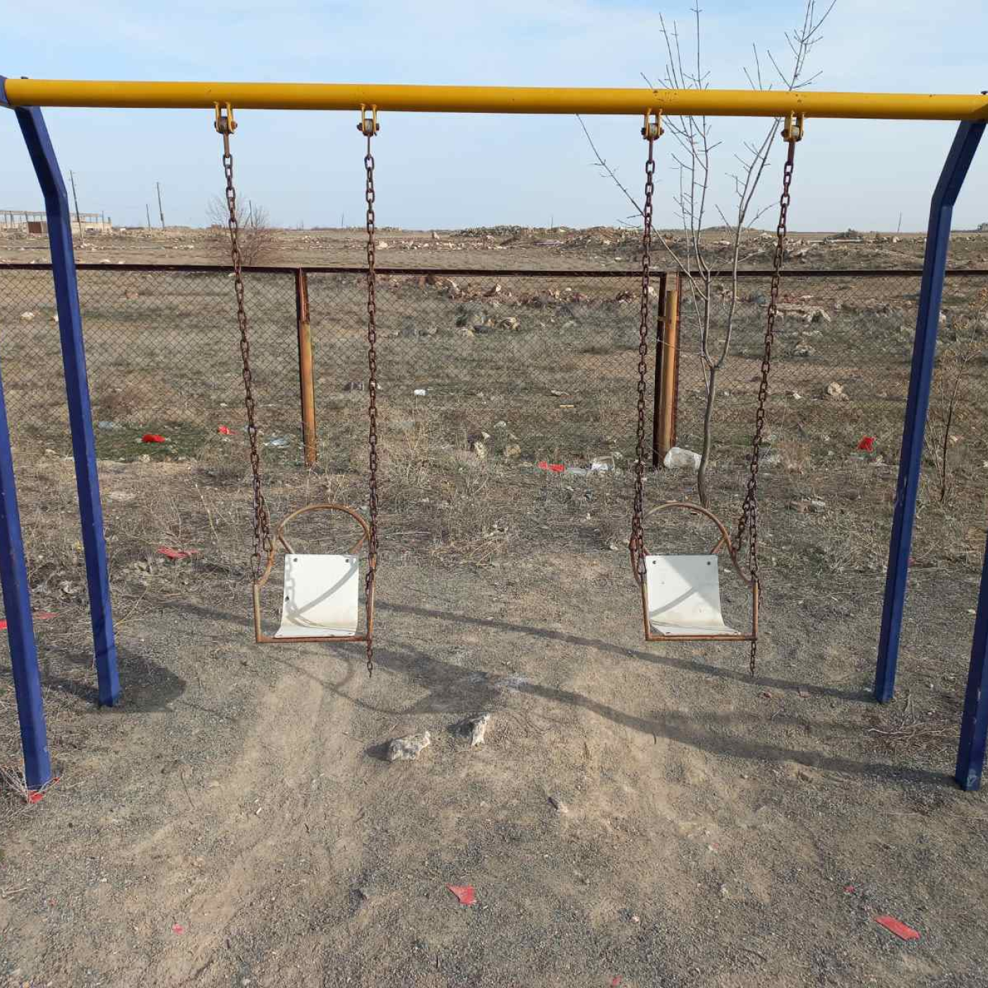 Old empty swing set in Armenia