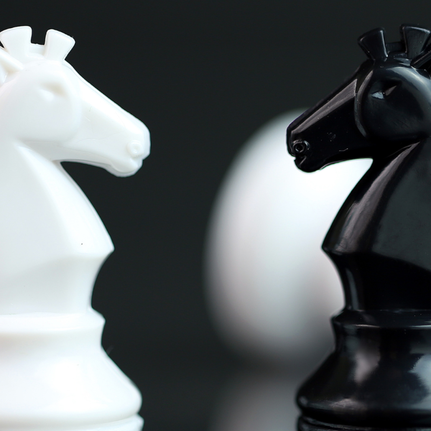 chess pieces facing each other. 