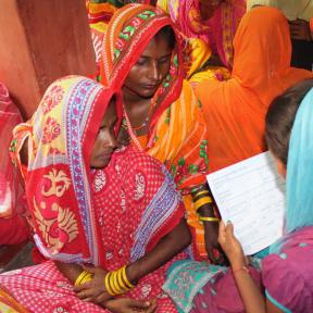 Women reading the report