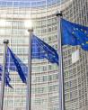 EU flags in front of building.