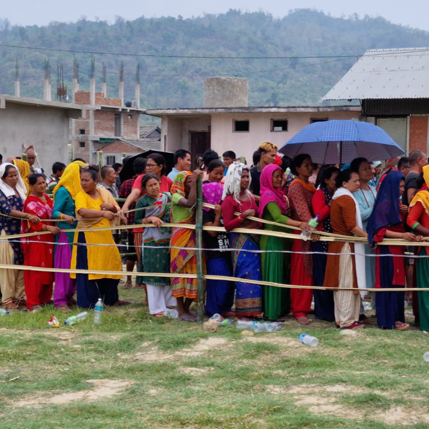 People in Nepal standing in line to vote