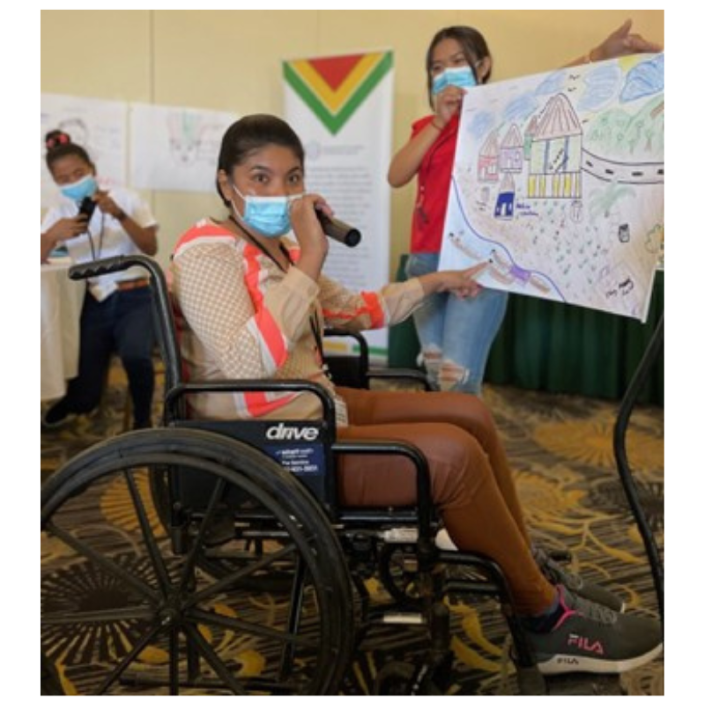 A young Indigenous woman with a disability presenting for her group during IFES’ Youth ALLIES Civic Education Training of Trainers in Guyana (March 2023).