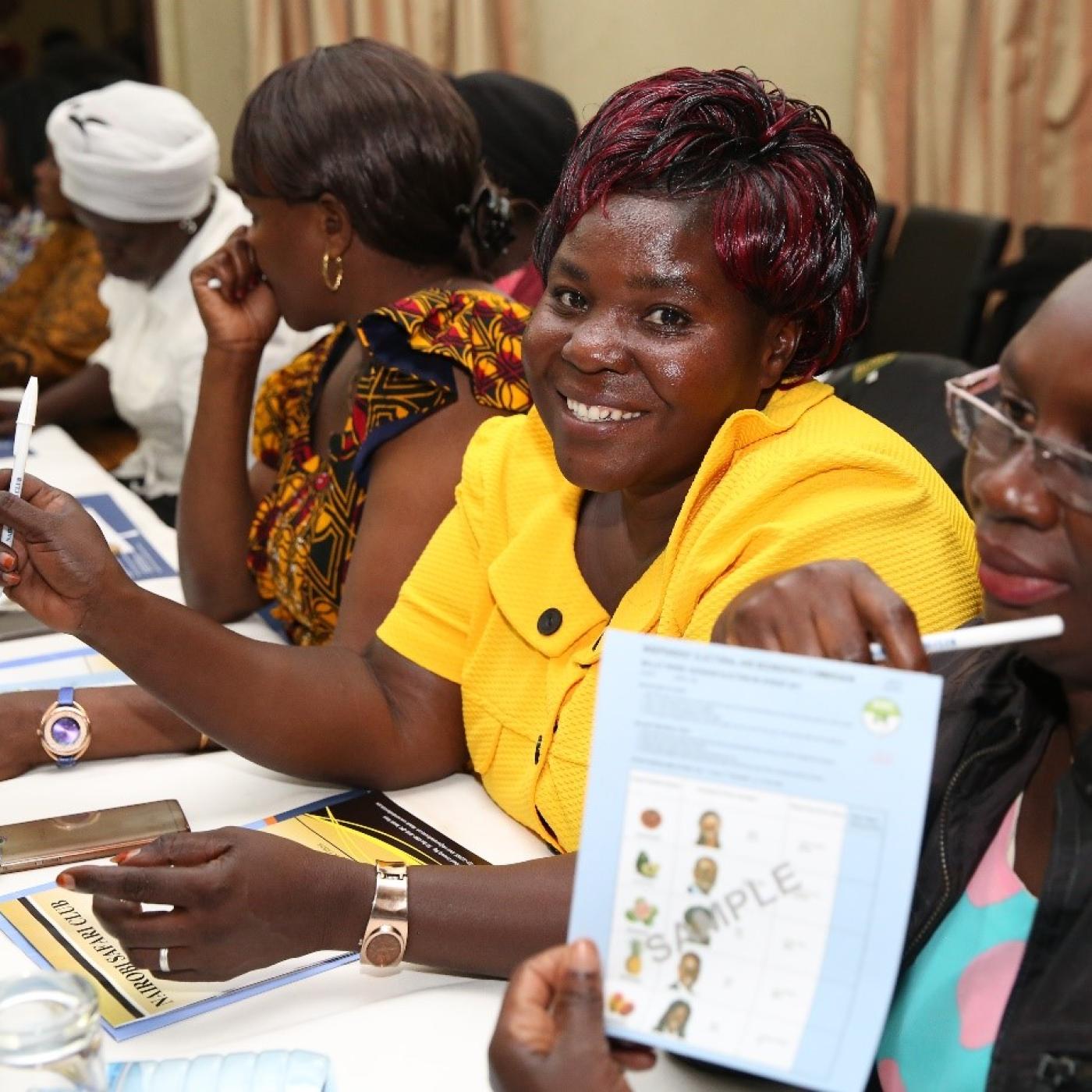 Chama women attend a voter education training session.